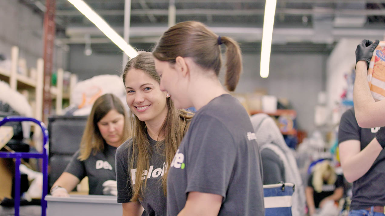 Deloitte employees volunteering for corporate responsibility