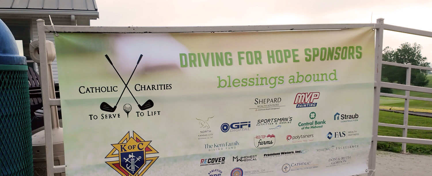 Catholic Charities golf sponsors banner