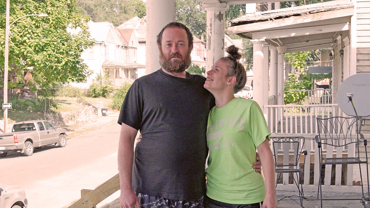 Couple standing on a porch