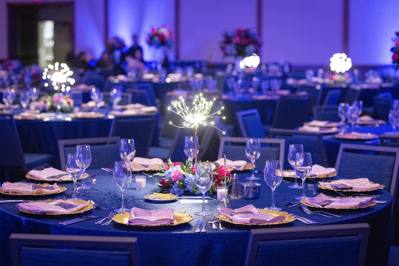 Hope Ball event setup with blue tables
