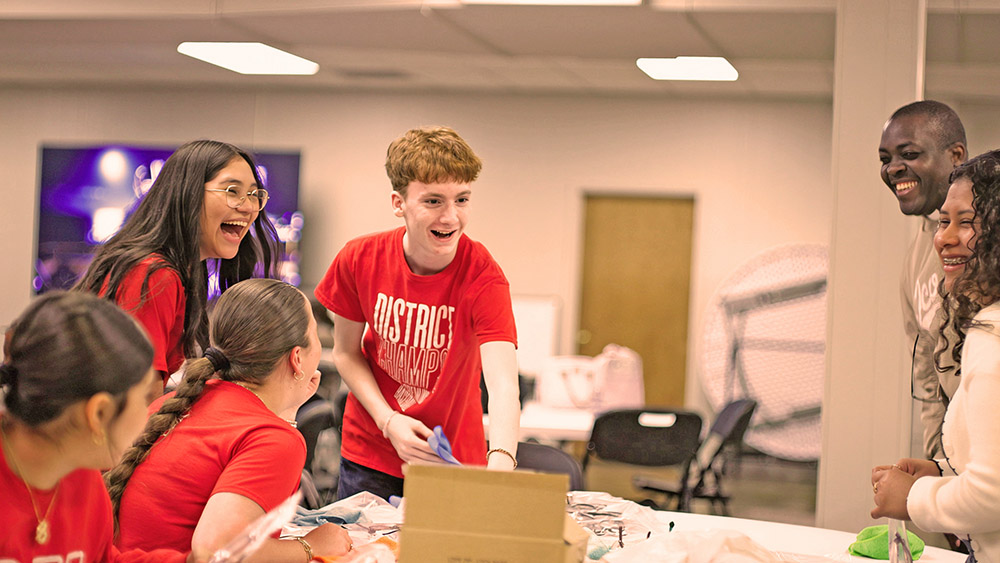Diverse group of young people laughing