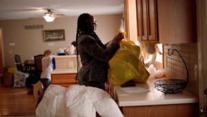 Woman packing donation bag