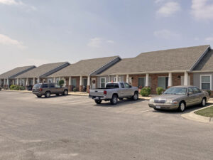 Apartment complex with parked cars