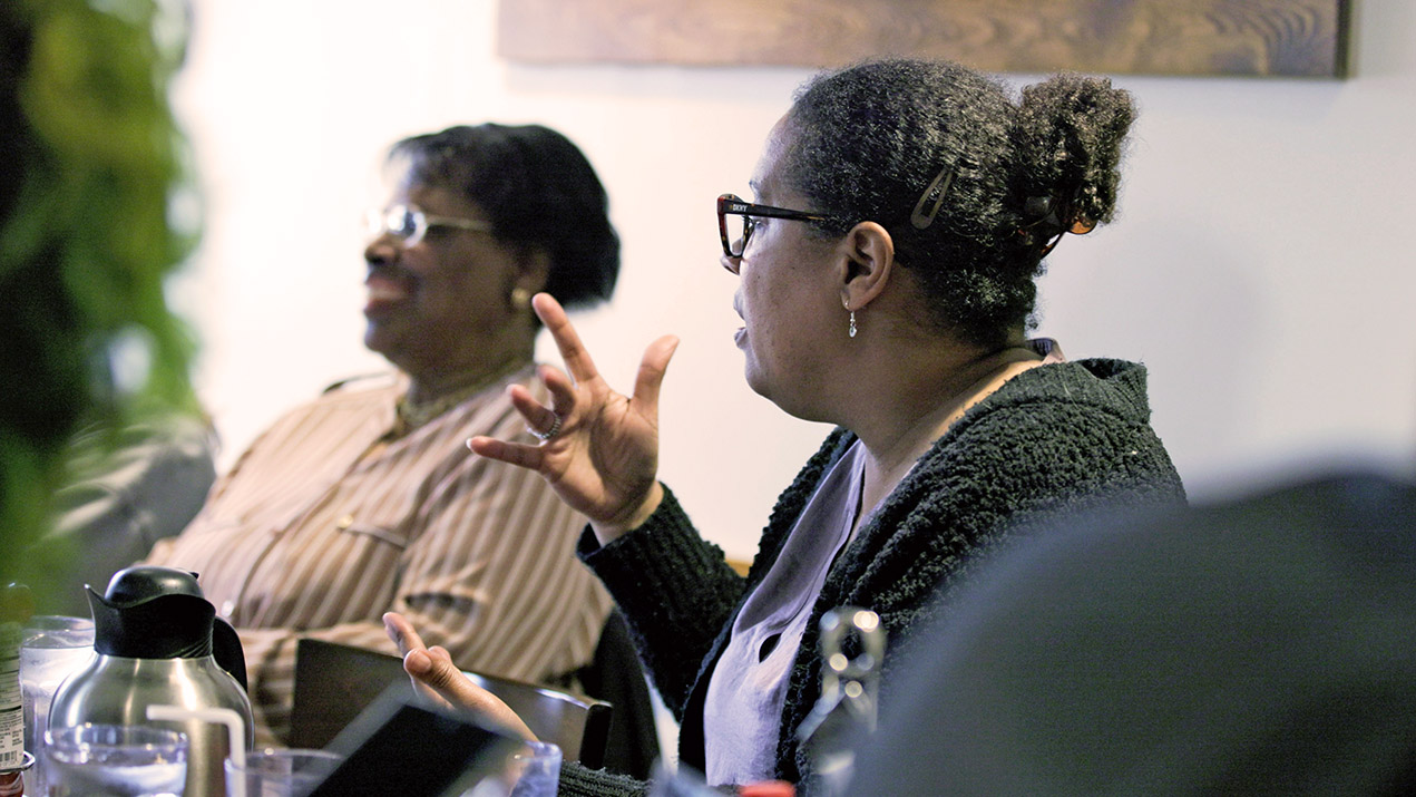 Two women speaking in ASL