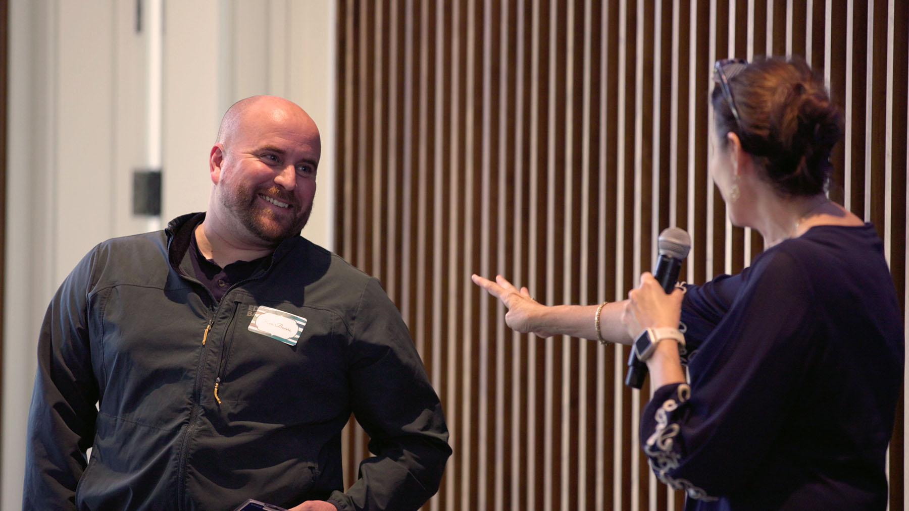 Man and woman talking at event